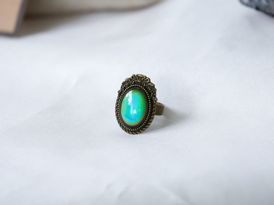 Bronze Ribbon Mood Ring with Iconic Features